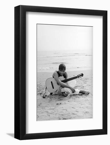 Adriano Celentano on the Sea Shore-Marisa Rastellini-Framed Photographic Print