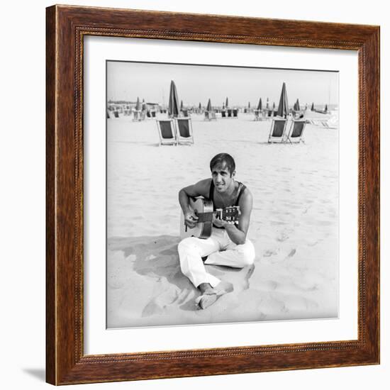 Adriano Celentano with the Guitar at the Beach-Marisa Rastellini-Framed Photographic Print