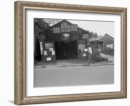 Advertisements for Popular Malaria Cure, Natchez, Mississippi, c.1935-Ben Shahn-Framed Photo