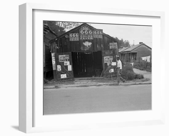 Advertisements for Popular Malaria Cure, Natchez, Mississippi, c.1935-Ben Shahn-Framed Photo