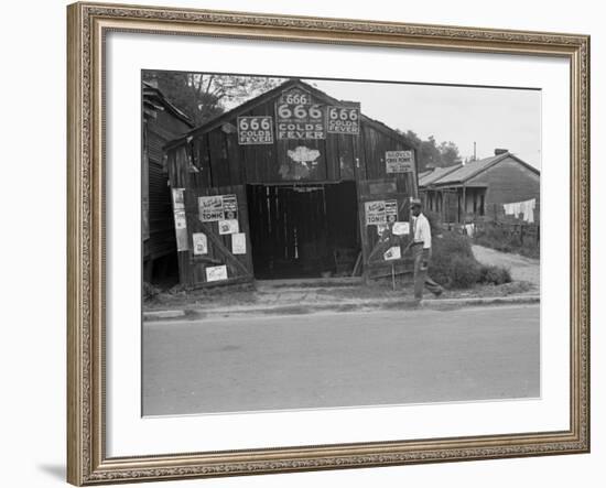 Advertisements for Popular Malaria Cure, Natchez, Mississippi, c.1935-Ben Shahn-Framed Photo