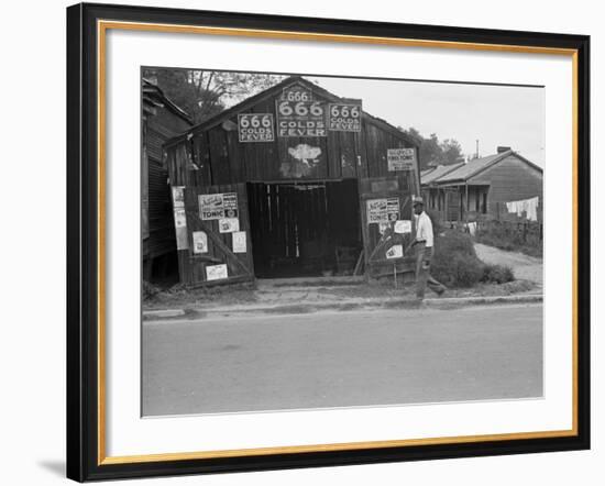 Advertisements for Popular Malaria Cure, Natchez, Mississippi, c.1935-Ben Shahn-Framed Photo