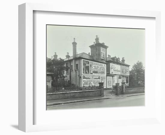 Advertising Hoardings on the Wall of a Building, Wandsworth, London, 1938-null-Framed Photographic Print