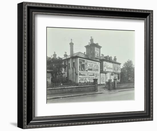 Advertising Hoardings on the Wall of a Building, Wandsworth, London, 1938-null-Framed Photographic Print