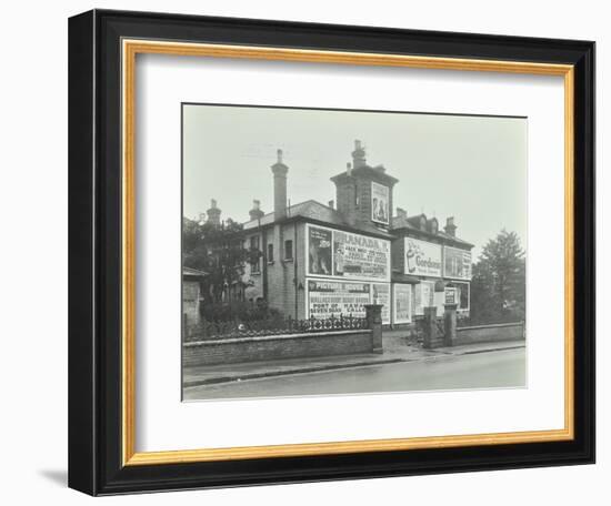 Advertising Hoardings on the Wall of a Building, Wandsworth, London, 1938-null-Framed Photographic Print