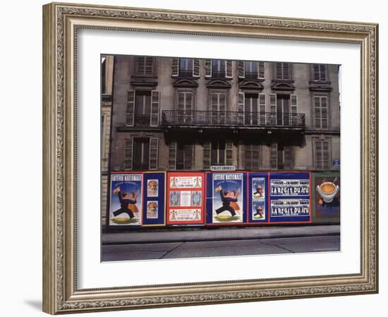 Advertising Posters Plastered on a Wall Along the Rue de Courcelles-William Vandivert-Framed Photographic Print