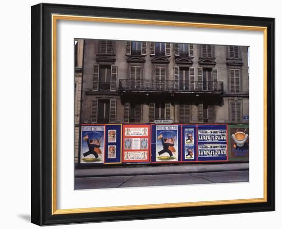 Advertising Posters Plastered on a Wall Along the Rue de Courcelles-William Vandivert-Framed Photographic Print