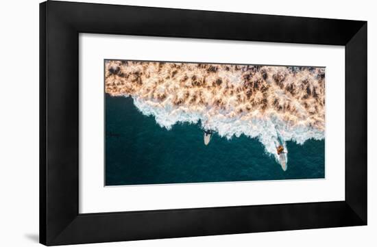 Aerial drone photo of surfers riding Pacific Ocean waves in San Diego, California at Sunset Cliffs-David Chang-Framed Photographic Print