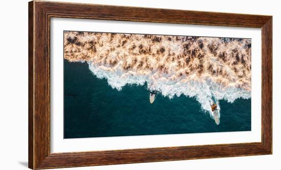 Aerial drone photo of surfers riding Pacific Ocean waves in San Diego, California at Sunset Cliffs-David Chang-Framed Photographic Print