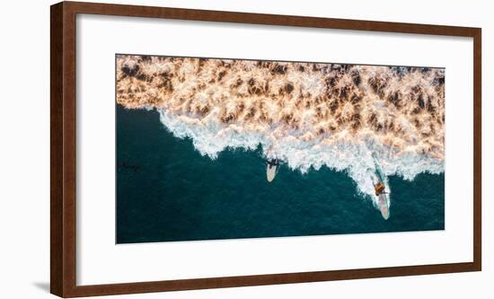 Aerial drone photo of surfers riding Pacific Ocean waves in San Diego, California at Sunset Cliffs-David Chang-Framed Photographic Print