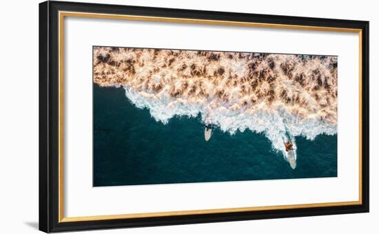 Aerial drone photo of surfers riding Pacific Ocean waves in San Diego, California at Sunset Cliffs-David Chang-Framed Photographic Print