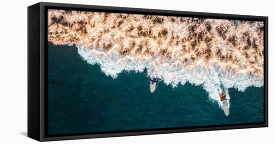 Aerial drone photo of surfers riding Pacific Ocean waves in San Diego, California at Sunset Cliffs-David Chang-Framed Premier Image Canvas