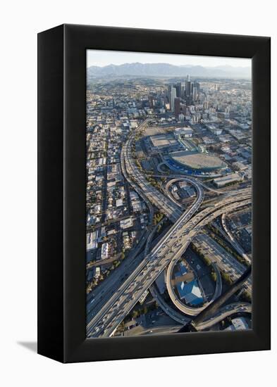 Aerial of Los Angeles with a Freeway Interchange in the Foreground and Downtown Usa-Natalie Tepper-Framed Stretched Canvas