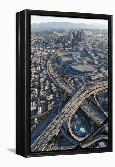 Aerial of Los Angeles with a Freeway Interchange in the Foreground and Downtown Usa-Natalie Tepper-Framed Stretched Canvas