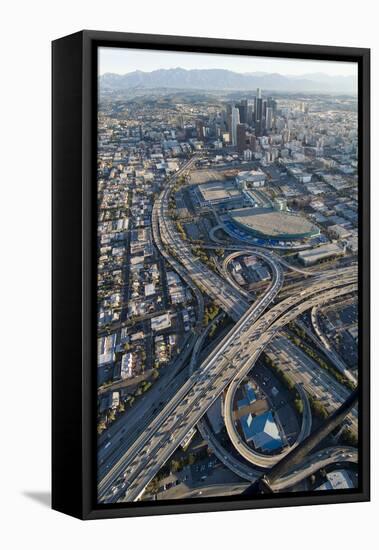 Aerial of Los Angeles with a Freeway Interchange in the Foreground and Downtown Usa-Natalie Tepper-Framed Stretched Canvas