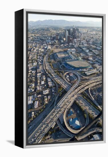 Aerial of Los Angeles with a Freeway Interchange in the Foreground and Downtown Usa-Natalie Tepper-Framed Stretched Canvas