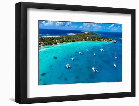 Aerial of the Rangiroa atoll and the Tiputa Pass, Tuamotus, French Polynesia-Michael Runkel-Framed Photographic Print