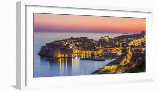 Aerial panorama of Dubrovnik Old Town at night with orange sunset sky, UNESCO World Heritage Site, -Neale Clark-Framed Photographic Print