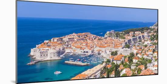 Aerial panorama of Old Port and Dubrovnik Old town, UNESCO World Heritage Site, Dubrovnik, Dalmatia-Neale Clark-Mounted Photographic Print