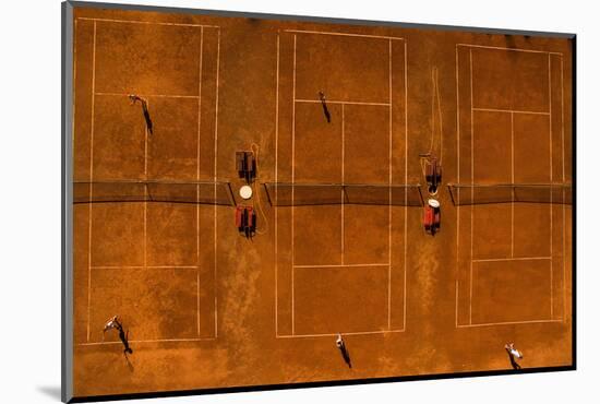 Aerial Shot of a Tennis Courts with Players in Warm Evening Sunlight-l i g h t p o e t-Mounted Photographic Print