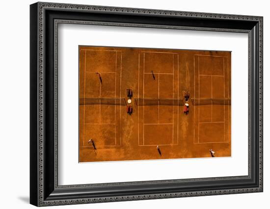 Aerial Shot of a Tennis Courts with Players in Warm Evening Sunlight-l i g h t p o e t-Framed Photographic Print