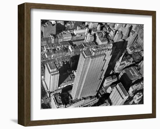 Aerial View Looking Down on 6th Ave. and 50th St. at Towering Rockefeller Center Complex-Margaret Bourke-White-Framed Premium Photographic Print