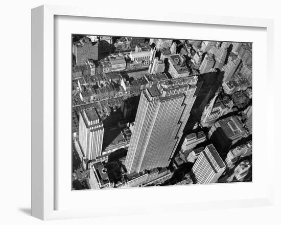 Aerial View Looking Down on 6th Ave. and 50th St. at Towering Rockefeller Center Complex-Margaret Bourke-White-Framed Premium Photographic Print