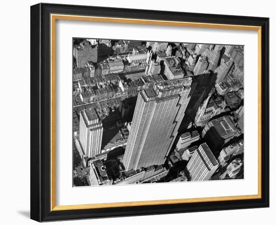 Aerial View Looking Down on 6th Ave. and 50th St. at Towering Rockefeller Center Complex-Margaret Bourke-White-Framed Photographic Print