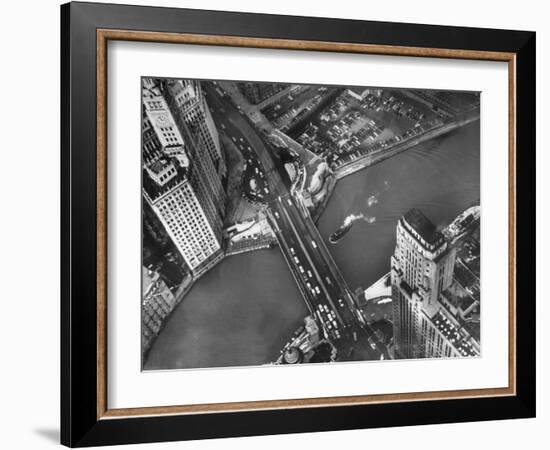 Aerial View of a Bridge Crossing a River Flowing Through the City-Margaret Bourke-White-Framed Photographic Print