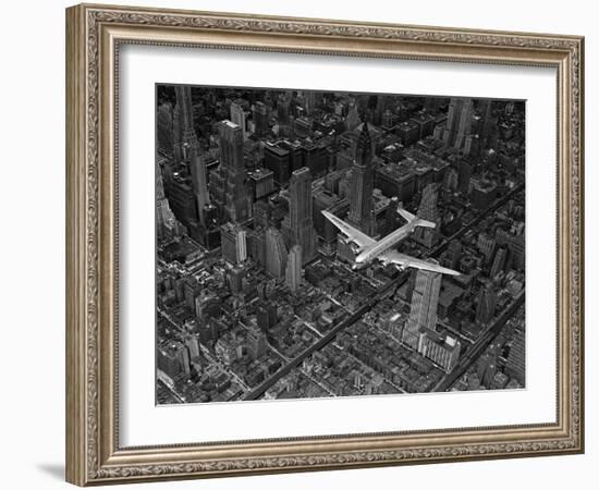 Aerial View of a DC-4 Passenger Plane Flying over Midtown Manhattan-Margaret Bourke-White-Framed Photographic Print