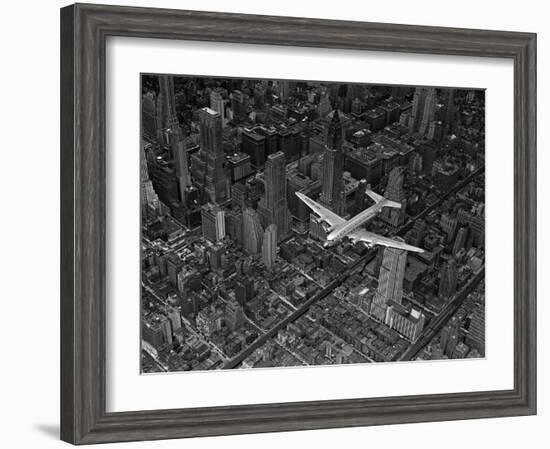 Aerial View of a DC-4 Passenger Plane Flying over Midtown Manhattan-Margaret Bourke-White-Framed Photographic Print