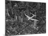 Aerial View of a Dc-4 Passenger Plane in Flight over Manhattan-Margaret Bourke-White-Mounted Premium Photographic Print