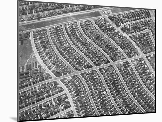 Aerial View of Acres of New Homes, Creating Compact Rows in Suburban Area Called Westchester-Loomis Dean-Mounted Photographic Print