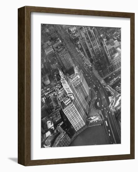 Aerial View of Buildings and a Bridge Crossing a River Flowing Through the City-Margaret Bourke-White-Framed Premium Photographic Print