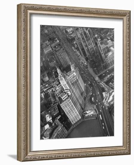 Aerial View of Buildings and a Bridge Crossing a River Flowing Through the City-Margaret Bourke-White-Framed Photographic Print