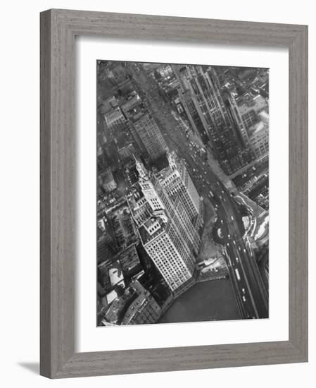 Aerial View of Buildings and a Bridge Crossing a River Flowing Through the City-Margaret Bourke-White-Framed Photographic Print