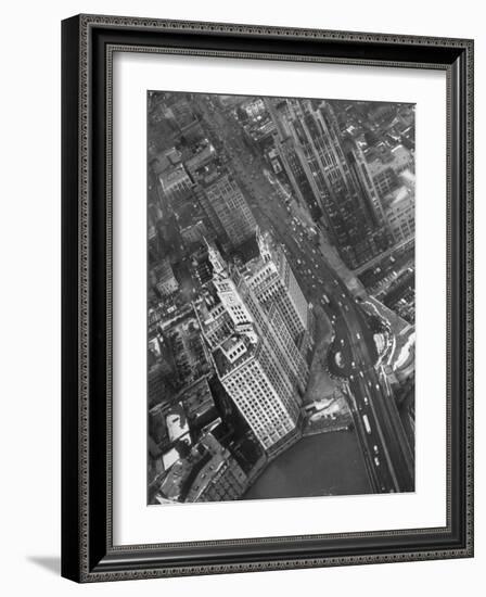 Aerial View of Buildings and a Bridge Crossing a River Flowing Through the City-Margaret Bourke-White-Framed Photographic Print