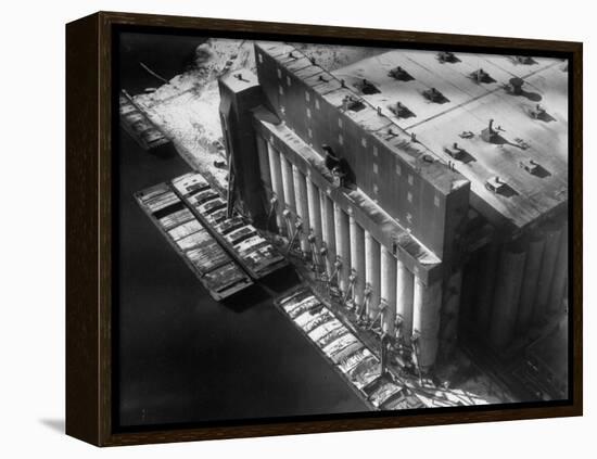 Aerial View of Cargill Grain Elevator with Barges Lined up on the Bank of the Chicago River-Margaret Bourke-White-Framed Premier Image Canvas