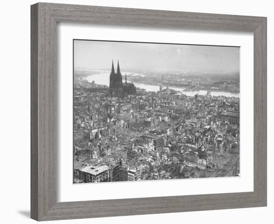 Aerial View of Cologne Showing Devastation of Allied Air Raids, Cathedral and Rhine River-John Florea-Framed Photographic Print