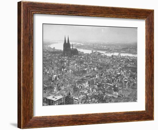 Aerial View of Cologne Showing Devastation of Allied Air Raids, Cathedral and Rhine River-John Florea-Framed Photographic Print