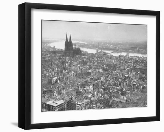 Aerial View of Cologne Showing Devastation of Allied Air Raids, Cathedral and Rhine River-John Florea-Framed Photographic Print