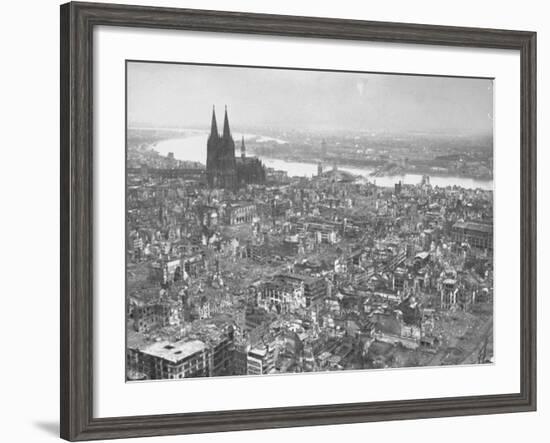 Aerial View of Cologne Showing Devastation of Allied Air Raids, Cathedral and Rhine River-John Florea-Framed Photographic Print