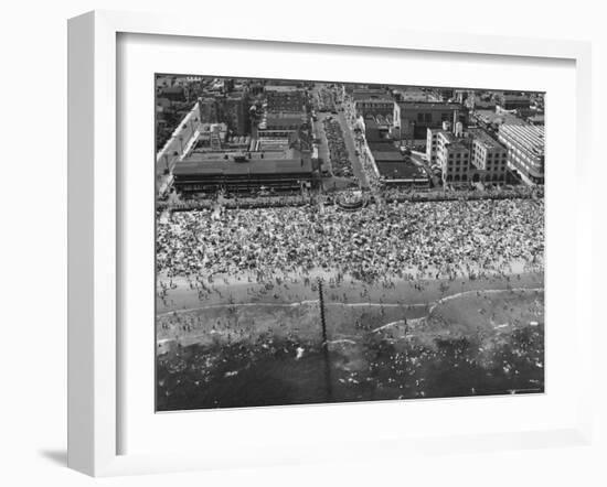 Aerial View of Crowds Enjoying a Hot 4th of July at Rockaway Beach-Sam Shere-Framed Photographic Print