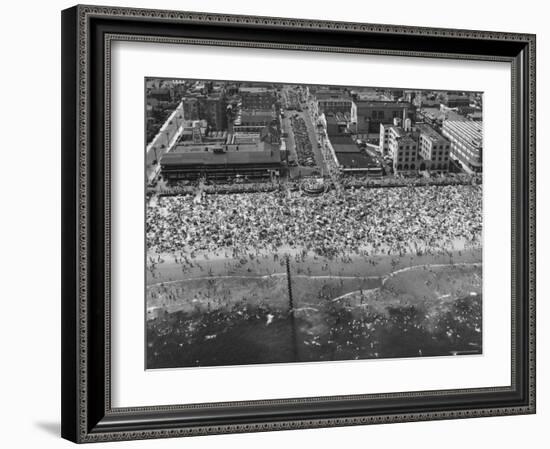 Aerial View of Crowds Enjoying a Hot 4th of July at Rockaway Beach-Sam Shere-Framed Photographic Print