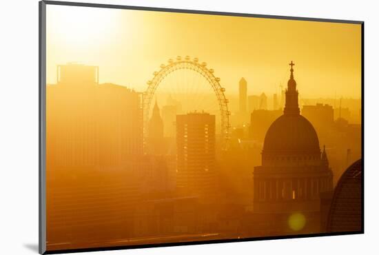 Aerial view of London skyline at sunset, including London Eye and St. Paul's Cathedral, London-Ed Hasler-Mounted Photographic Print