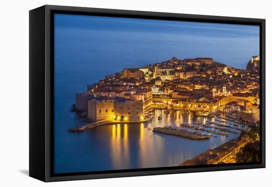 Aerial view of Old Port and Dubrovnik Old Town at night, UNESCO World Heritage Site, Dubrovnik, Dal-Neale Clark-Framed Premier Image Canvas