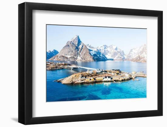 Aerial view of Olstind mountain peak and turquoise sea surrounding Sakrisoy village and Reine Bay-Roberto Moiola-Framed Photographic Print