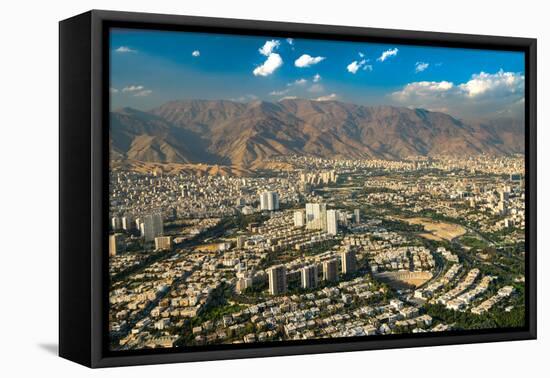 Aerial view of Tehran facing North towards the Alborz Mountains, Tehran, Iran, Middle East-James Strachan-Framed Premier Image Canvas