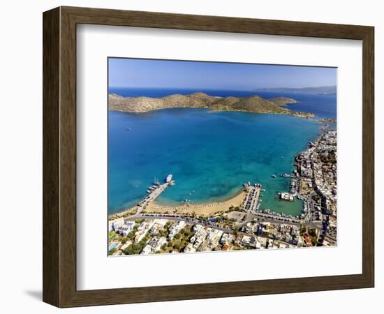 Aerial view of the popular high-end tourist town of Elounda, Crete, Greek Islands, Greece, Europe-Sakis Papadopoulos-Framed Photographic Print
