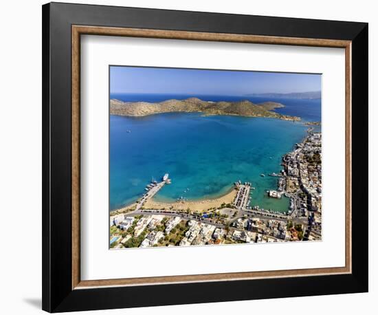 Aerial view of the popular high-end tourist town of Elounda, Crete, Greek Islands, Greece, Europe-Sakis Papadopoulos-Framed Photographic Print